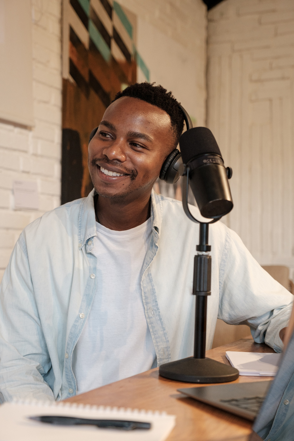 Portrait of a Smiling Man Doing Podcast