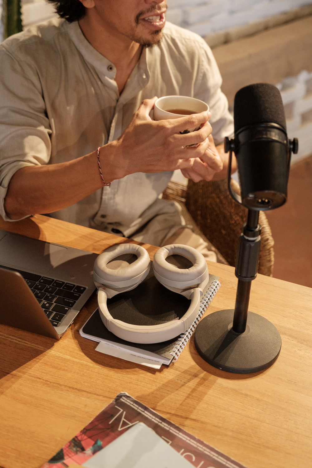 Portrait of a Male Podcaster Drinking Coffee